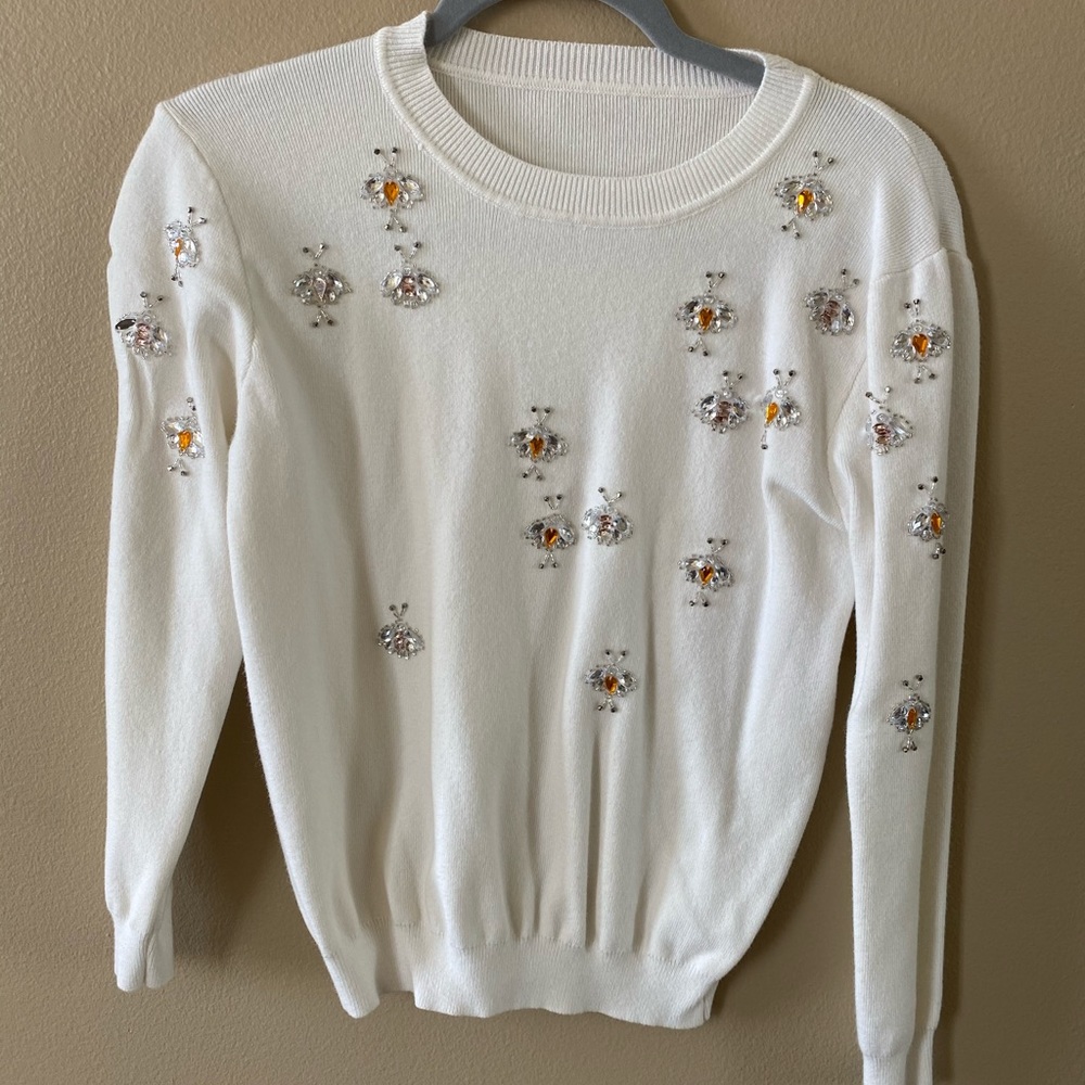 White sweater with rhinestone bees